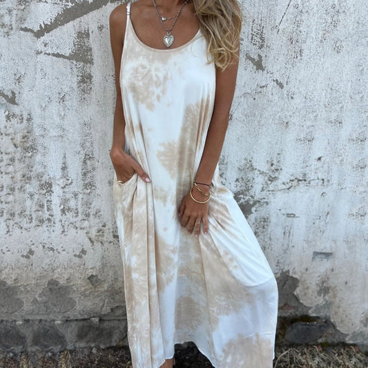 Kvinnors tryckta klänning med spagettiband och öppen rygg