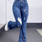 Blå hjärtan 💙 Högmidjade vintagejeans i patchwork med hjärtmotiv och slitningar