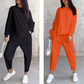 Set med långärmade sweatshirts och byxor med oregelbunden nederkant för kvinnor