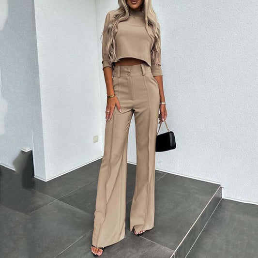 Elegant set med crop top och byxor med vida ben för kvinnor