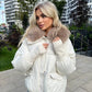 Kort puffjacka för damer med krage i fuskpäls
