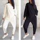 Set med långärmade sweatshirts och byxor med oregelbunden nederkant för kvinnor