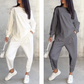 Set med långärmade sweatshirts och byxor med oregelbunden nederkant för kvinnor