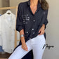 Långärmad denimblus med lösa uppslag