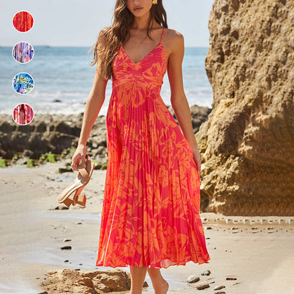 V-ringade ärmlösa klänningar med tryck på dammode