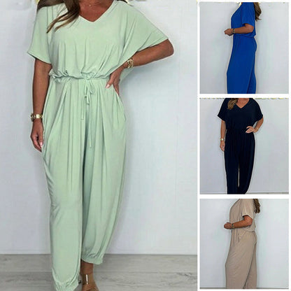 V-ringad enfärgad jumpsuit med lös midja för kvinnor