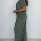 V-ringad enfärgad jumpsuit med lös midja för kvinnor