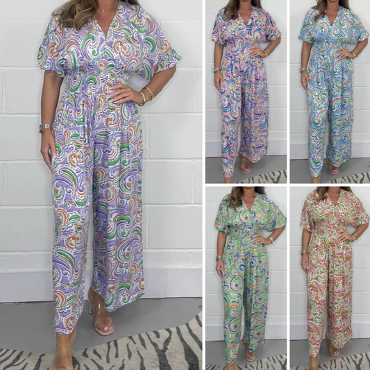 Elegant V-ringad jumpsuit med tryck och vida ben för kvinnor