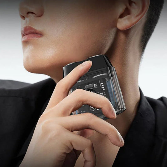 Bärbar elektrisk rakapparat med minipower