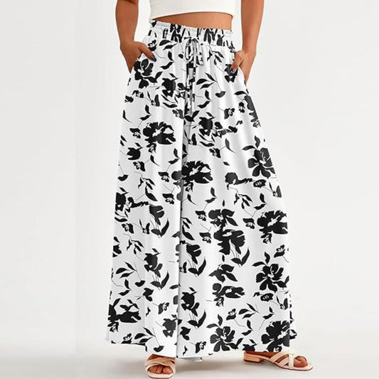 Blommiga byxor med hög midja och vida ben