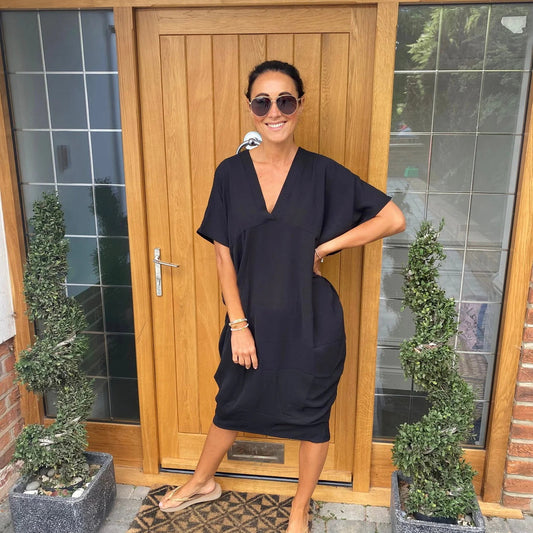 Eleganta och chica klänningar med V-ringning