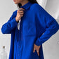 Elegant feminint set bestående av skjorta och byxor