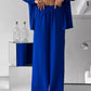 Elegant feminint set bestående av skjorta och byxor