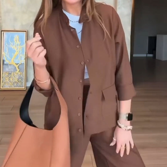 Set med enfärgad lös skjorta och byxor med hög midja