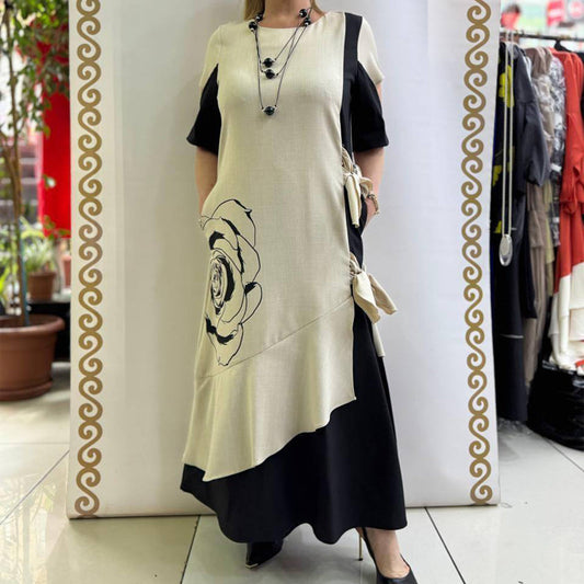 Färgblockerande maxiklänning med volang och fåll