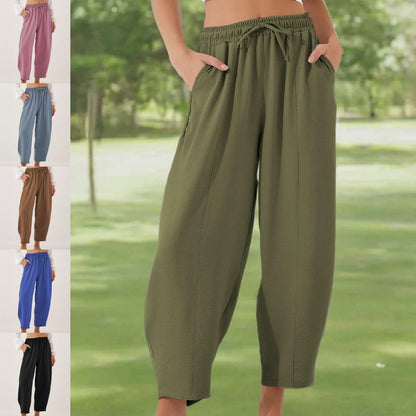 Moderna, rymliga dambyxor i bomull och linne med dragsko