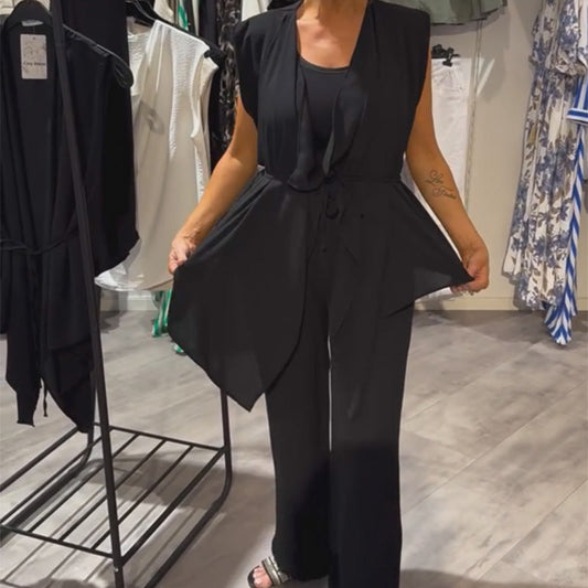 Svart ärmlöst set – asymmetrisk topp och byxor med vida ben