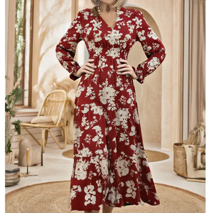 V-ringad midjekantad maxiklänning med blommönster och långa ärmar