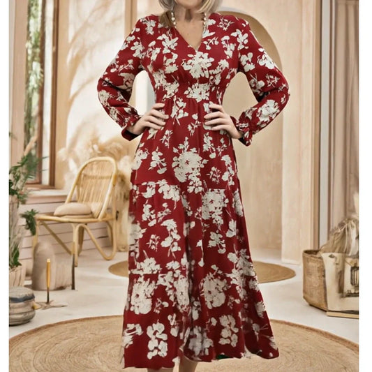 V-ringad midjekantad maxiklänning med blommönster och långa ärmar