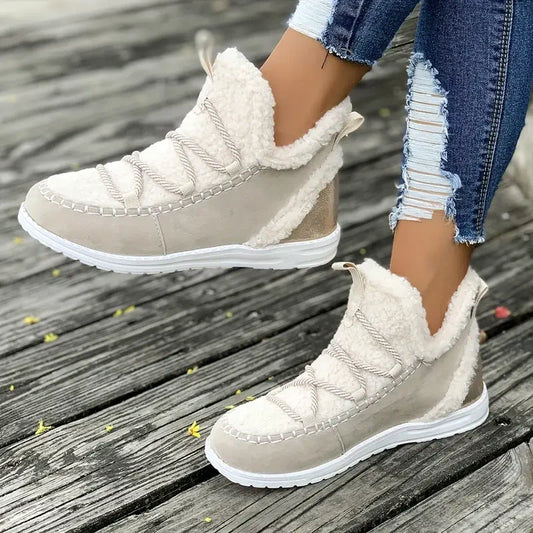 Kvinnors bekväma, mysiga snöstövlar som når till mitten av vaden