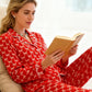 Långärmad pyjamas för kvinnor med hjärtmönster och knappar