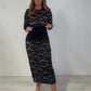 Kvinnors svarta spetslångärmad klänning