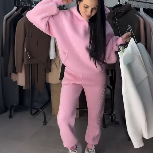 Tvådelad träningsoverall med huva för damer