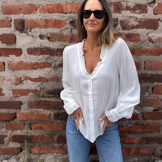 Chic topp med puffärmar, V-ringning och volangkant