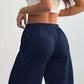 Casual sweatpants för damer med vid ben och dragsko