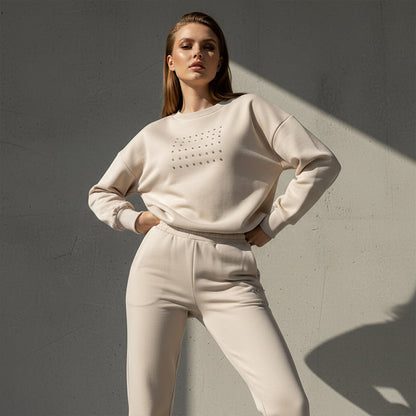 Bekvämt set med sweatshirt och byxor med rund hals