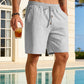 Enfärgade strandshorts med lös passform för män