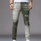 Slim fit-jeans för män med tonad effekt och slitningar