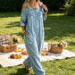 👗👖 Cold-shoulder jumpsuit med vida ben och fickor