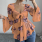 Blus för damer med blommönster, fyrkantig halsringning och knytning framtill