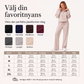 Set med halvdragkedja, slagkrage topp och vida byxor för kvinnor