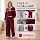 Damset med randig sweatshirt och vida byxor