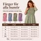 Damklänning med rynkningar och blommönster