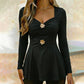 Damtopp med V-ringning och peplum med blommotiv