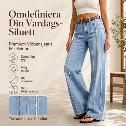 Damens stretchiga jeans med vida ben och rå kant