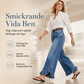 Damjeans med bekväm stretch, vida ben, veckad midja och volangkant