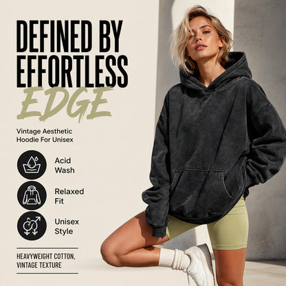 Unisex-hoodie i avslappnad stil med oversized-passform och acid wash-effekt