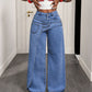 Damhoodiga trendsatta jeans med asymmetrisk överlappning och vid ben