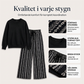 Damset i vardagsstil med crewneck-topp och mönstrade byxor