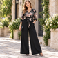 Elegant, blommig, kroppsnära jumpsuit med vida ben