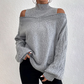Dammodestickad tröja med hög krage och off-shoulder-design