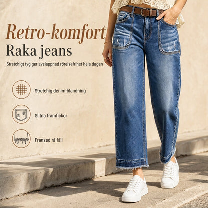 Dammiga stretchiga raka jeans i vintage-stil för kvinnor med slitna fickor och sliten fåll