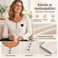 Damset i ribbstickad pyjamas med hjärtbroderi